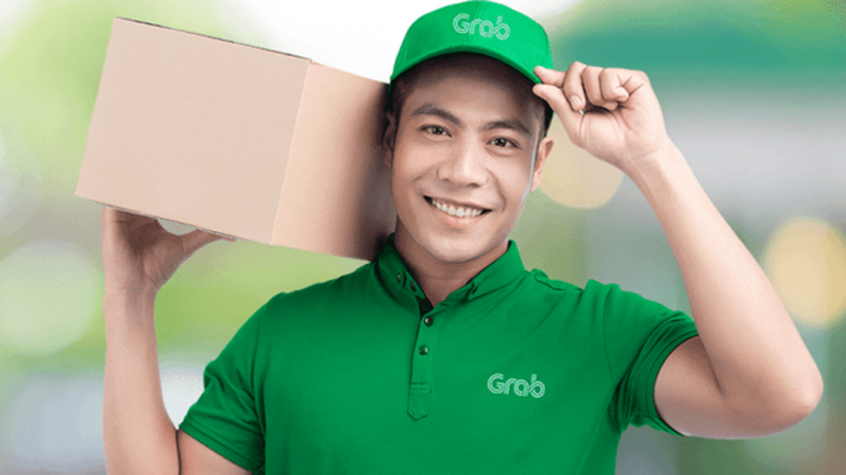 Shopee bắt tay Grab cam kết giao hàng trong 1 giờ